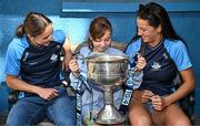 4 August 2025; TG4 All-Ireland Ladies Senior Football Champions Dublin footballers Orlagh Nolan and Rachel Hartnett pictured with the Brendan Martin Cup and Katie Brennan, aged 11, from Navan in Meath, during a visit by the players to Children's Health Ireland at Crumlin, Dublin. Photo by Sam Barnes/Sportsfile