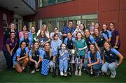 4 August 2025; TG4 All-Ireland Ladies Senior Football Champions Dublin pictured with the Brendan Martin Cup and hospital patients and staff during a visit by the players to Children's Health Ireland at Crumlin, Dublin. Photo by Sam Barnes/Sportsfile