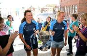 4 August 2025; TG4 All-Ireland Ladies Senior Football Champions Dublin footballers Leah Caffey and Carla Rowe pictured with the Brendan Martin Cup during a visit by the players to Children's Health Ireland at Crumlin, Dublin. Photo by Sam Barnes/Sportsfile