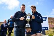 4 August 2025; GAA National Head of Hurling Willie Maher, left, presents the trophy to Senior Hurling winner Colin Ryan of Limerick after the M. Donnelly GAA Poc Fada All-Ireland Finals at Annaverna Mountain in the Cooley Peninsula, Ravensdale, Louth. Photo by Piaras Ó Mídheach/Sportsfile