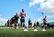 4 August 2025; Longford Town players warm up before the SSE Airtricity Men's First Division match between Dundalk and Longford Town at Oriel Park in Dundalk, Louth. Photo by Thomas Flinkow/Sportsfile