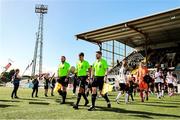 4 August 2025; Match officials and players enter the pitch during the SSE Airtricity Men's First Division match between Dundalk and Longford Town at Oriel Park in Dundalk, Louth. Photo by Thomas Flinkow/Sportsfile