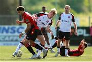4 August 2025; Rohan Vaughan of Dundalk in action against Pharrell Manuel of Longford Town during the SSE Airtricity Men's First Division match between Dundalk and Longford Town at Oriel Park in Dundalk, Louth. Photo by Thomas Flinkow/Sportsfile