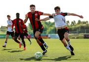 4 August 2025; Eoin Kenny of Dundalk in action against Andrew Spain of Longford Town during the SSE Airtricity Men's First Division match between Dundalk and Longford Town at Oriel Park in Dundalk, Louth. Photo by Thomas Flinkow/Sportsfile