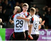 4 August 2025; Eoin Kenny of Dundalk, back, celebrates with teammates Rohan Vaughan, 29, and John Ross Wilson after scoring his side's first goal during the SSE Airtricity Men's First Division match between Dundalk and Longford Town at Oriel Park in Dundalk, Louth. Photo by Thomas Flinkow/Sportsfile