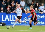 4 August 2025; Rohan Vaughan of Dundalk in action against Dean O'Shea of Longford Town during the SSE Airtricity Men's First Division match between Dundalk and Longford Town at Oriel Park in Dundalk, Louth. Photo by Thomas Flinkow/Sportsfile