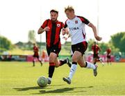 4 August 2025; Rohan Vaughan of Dundalk in action against Andrew Spain of Longford Town during the SSE Airtricity Men's First Division match between Dundalk and Longford Town at Oriel Park in Dundalk, Louth. Photo by Thomas Flinkow/Sportsfile