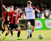 4 August 2025; Eoin Kenny of Dundalk in action against Daniel Norris of Longford Town during the SSE Airtricity Men's First Division match between Dundalk and Longford Town at Oriel Park in Dundalk, Louth. Photo by Thomas Flinkow/Sportsfile