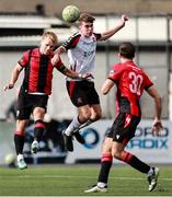 4 August 2025; Eoin Kenny of Dundalk in action against Dean O'Shea of Longford Town during the SSE Airtricity Men's First Division match between Dundalk and Longford Town at Oriel Park in Dundalk, Louth. Photo by Thomas Flinkow/Sportsfile