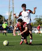 4 August 2025; Mohammed Boudiaf of Longford Town is tackled by Shane Tracey of Dundalk during the SSE Airtricity Men's First Division match between Dundalk and Longford Town at Oriel Park in Dundalk, Louth. Photo by Thomas Flinkow/Sportsfile