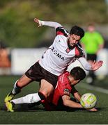 4 August 2025; Declan McDaid of Dundalk in action against Mohammed Boudiaf of Longford Town during the SSE Airtricity Men's First Division match between Dundalk and Longford Town at Oriel Park in Dundalk, Louth. Photo by Thomas Flinkow/Sportsfile