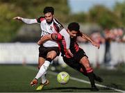 4 August 2025; Declan McDaid of Dundalk in action against Mohammed Boudiaf of Longford Town during the SSE Airtricity Men's First Division match between Dundalk and Longford Town at Oriel Park in Dundalk, Louth. Photo by Thomas Flinkow/Sportsfile