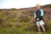 4 August 2025; A young spectator looks on during the M. Donnelly GAA Poc Fada All-Ireland Finals at Annaverna Mountain in the Cooley Peninsula, Ravensdale, Louth. Photo by Shauna Clinton/Sportsfile
