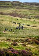 4 August 2025; Participants make their way along the course during the M. Donnelly GAA Poc Fada All-Ireland Finals at Annaverna Mountain in the Cooley Peninsula, Ravensdale, Louth. Photo by Shauna Clinton/Sportsfile