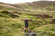 4 August 2025; A steward crosses a small bridge during the M. Donnelly GAA Poc Fada All-Ireland Finals at Annaverna Mountain in the Cooley Peninsula, Ravensdale, Louth. Photo by Shauna Clinton/Sportsfile