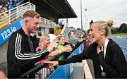 2 August 2025; Sharlene Mawdsley of Newport AC, Tipperary, shares a joke with her partner, Tipperary hurler Michael Breen after winning the senior women's 200m during day one of the 153rd 123.ie National Track & Field Senior Championships at Morton Stadium in Dublin. Photo by Sam Barnes/Sportsfile