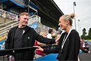 2 August 2025; Sharlene Mawdsley of Newport AC, Tipperary, shares a joke with her partner, Tipperary hurler Michael Breen after winning the senior women's 200m during day one of the 153rd 123.ie National Track & Field Senior Championships at Morton Stadium in Dublin. Photo by Sam Barnes/Sportsfile