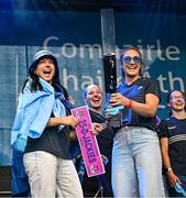 5 August 2025; Sinéad Goldrick, left, and Éilish O'Dowd during the homecoming of TG4 All-Ireland Ladies Senior Football Champions, Dublin, at Smithfield Square in Dublin. Photo by Sam Barnes/Sportsfile