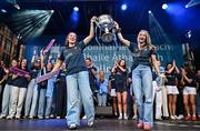 5 August 2025; Niamh Donlon, left, and Caoimhe O'Connor with The Brendan Martin Cup during the homecoming of TG4 All-Ireland Ladies Senior Football Champions, Dublin, at Smithfield Square in Dublin. Photo by Sam Barnes/Sportsfile