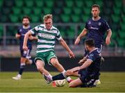 3 August 2025; Michael Noonan of Shamrock Rovers has a shot on goal blocked by Adam O'Reilly of Derry City during the SSE Airtricity Men's Premier Division match between Shamrock Rovers and Derry City at Tallaght Stadium in Dublin.  Photo by Stephen McCarthy/Sportsfile