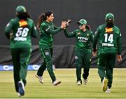 6 August 2025; Sidra Amin of Pakistan, second from right, celebrates with teamates after catching out Leah Paul of Ireland during match one of the Women's T20 International Series between Ireland and Pakistan at Clontarf Cricket Club in Dublin. Photo by Sam Barnes/Sportsfile