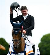6 August 2025; Michael Pender of Ireland salutes the crowd after winning the Minerva Stakes on Hhs Fortune during the Dublin Horse Show at the RDS Arena in Dublin. Photo by Shauna Clinton/Sportsfile