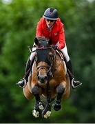 6 August 2025; Laura Kraut of USA, competing on Bisquetta, in the Minerva Stakes during the Dublin Horse Show at the RDS Arena in Dublin. Photo by Shauna Clinton/Sportsfile