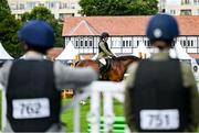 6 August 2025; Two young riders look on during the Dublin Horse Show at the RDS Arena in Dublin. Photo by Shauna Clinton/Sportsfile