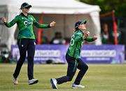 6 August 2025; Gaby Lewis of Ireland, right, celebrates after catching out Rameen Shamim of Pakistan during match one of the Women's T20 International Series between Ireland and Pakistan at Clontarf Cricket Club in Dublin. Photo by Sam Barnes/Sportsfile