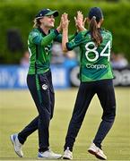 6 August 2025; Gaby Lewis of Ireland, left, celebrates with teammate Orla Prendergast after catching out Rameen Shamim of Pakistan during match one of the Women's T20 International Series between Ireland and Pakistan at Clontarf Cricket Club in Dublin. Photo by Sam Barnes/Sportsfile