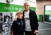 6 August 2025; Head coach Ole Gunnar Solskjaer poses for a photograph with Adam McGill, son of St Patrick's Athletic kit and equipment manager David McGill, before a Besiktas media conference at Tallaght Stadium in Dublin. Photo by Stephen McCarthy/Sportsfile