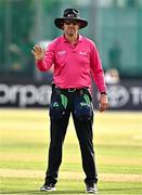 6 August 2025; Umpire Gareth Morrison signals a four during match one of the Women's T20 International Series between Ireland and Pakistan at Clontarf Cricket Club in Dublin. Photo by Sam Barnes/Sportsfile