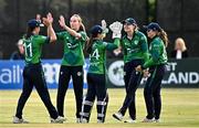 6 August 2025; Ireland players, from left, Arlene Kelly, Orla Prendergast, Amy Hunter, Gaby Lewis and Cara Murray celebrate the wicket of Natalia Parvaiz of Pakistan during match one of the Women's T20 International Series between Ireland and Pakistan at Clontarf Cricket Club in Dublin. Photo by Sam Barnes/Sportsfile