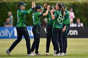 6 August 2025; Ireland players celebrate the wicket of Diana Baig of Pakistan during match one of the Women's T20 International Series between Ireland and Pakistan at Clontarf Cricket Club in Dublin. Photo by Sam Barnes/Sportsfile
