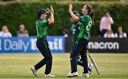 6 August 2025; Arlene Kelly of Ireland, left, celebrates with Orla Prendergast after catching out Diana Baig of Pakistan during match one of the Women's T20 International Series between Ireland and Pakistan at Clontarf Cricket Club in Dublin. Photo by Sam Barnes/Sportsfile