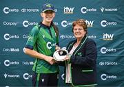6 August 2025; Cricket Ireland president Donna Armstrong presented Orla Prendergast of Ireland with the player of the match award after match one of the Women's T20 International Series between Ireland and Pakistan at Clontarf Cricket Club in Dublin. Photo by Sam Barnes/Sportsfile