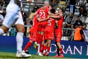 6 August 2025; Shelbourne players celebrate after their side's first goal, scored by Sam Bone, hidden, during the UEFA Europa League third qualifying round first leg match between Rijeka and Shelbourne at HNK Rijeka Stadium Rujevica in Rijeka, Croatia. Photo by Natasa Kupljenik/Sportsfile