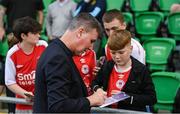7 August 2025; St Patrick's Athletic manager Stephen Kenny with young supporters before the UEFA Conference League Third Qualifying Round first leg match between St Patrick's Athletic and Besiktas at Tallaght Stadium in Dublin. Photo by Stephen McCarthy/Sportsfile