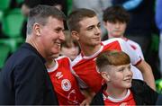 7 August 2025; St Patrick's Athletic manager Stephen Kenny with young supporters before the UEFA Conference League Third Qualifying Round first leg match between St Patrick's Athletic and Besiktas at Tallaght Stadium in Dublin. Photo by Stephen McCarthy/Sportsfile