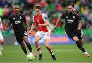 7 August 2025; Kian Leavy of St Patrick's Athletic in action against João Mário, left, and Orkun Kokçu of Besiktas during the UEFA Conference League Third Qualifying Round first leg match between St Patrick's Athletic and Besiktas at Tallaght Stadium in Dublin. Photo by Stephen McCarthy/Sportsfile