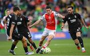 7 August 2025; Kian Leavy of St Patrick's Athletic in action against David Jurásek, left, and Orkun Kokçu of Besiktas during the UEFA Conference League Third Qualifying Round first leg match between St Patrick's Athletic and Besiktas at Tallaght Stadium in Dublin. Photo by Stephen McCarthy/Sportsfile
