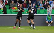 7 August 2025; João Mário of Besiktas, left, celebrates with team-mate David Jurásek after scoring their side's first goal during the UEFA Conference League Third Qualifying Round first leg match between St Patrick's Athletic and Besiktas at Tallaght Stadium in Dublin. Photo by Stephen McCarthy/Sportsfile