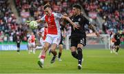 7 August 2025; Mason Melia of St Patrick's Athletic in action against Emirhan Topçu of Besiktas during the UEFA Conference League Third Qualifying Round first leg match between St Patrick's Athletic and Besiktas at Tallaght Stadium in Dublin. Photo by Stephen McCarthy/Sportsfile