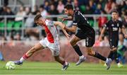 7 August 2025; Mason Melia of St Patrick's Athletic in action against Demir Ege Tiknaz of Besiktas during the UEFA Conference League Third Qualifying Round first leg match between St Patrick's Athletic and Besiktas at Tallaght Stadium in Dublin. Photo by Stephen McCarthy/Sportsfile