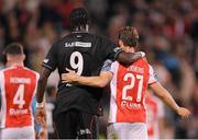 7 August 2025; Tammy Abraham of Besiktas and Axel Sjoberg of St Patrick's Athletic after the UEFA Conference League Third Qualifying Round first leg match between St Patrick's Athletic and Besiktas at Tallaght Stadium in Dublin. Photo by Stephen McCarthy/Sportsfile