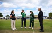 8 August 2025; Ireland captain Gaby Lewis with Pakistan captain Fatima Sana, broadcaster Isobel Joyce and match referee Graham McCrea during the coin toss before match two of the Women's T20 International Series between Ireland and Pakistan at Castle Avenue Cricket Ground in Dublin. Photo by Seb Daly/Sportsfile