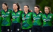 8 August 2025; Ireland players, from left, Rebecca Stokell, Ava Canning, Jane Maguire, Arlene Kelly and Cara Murray before match two of the Women's T20 International Series between Ireland and Pakistan at Castle Avenue Cricket Ground in Dublin. Photo by Seb Daly/Sportsfile