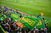 3 August 2025; Meath supporters wave their flags as players return to the pitch after half-time during the TG4 All-Ireland Ladies Football Senior Championship final match between Dublin and Meath at Croke Park in Dublin. Photo by Shauna Clinton/Sportsfile