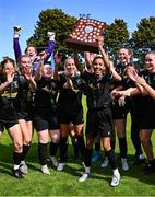 9 August 2025; St Francis captain Holly Rutherford lifts the shield after her side's victory in the FAI Women’s Amateur Shield Final match between St Francis and Cabinteely at Home Farm FC in Whitehall, Dublin. Photo by Piaras Ó Mídheach/Sportsfile