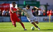 9 August 2025; James Clarke of Bohemians in action against Ellis Chapman of Shelbourne during the SSE Airtricity Men's Premier Division match between Shelbourne and Bohemians at Tolka Park in Dublin. Photo by Tyler Miller/Sportsfile